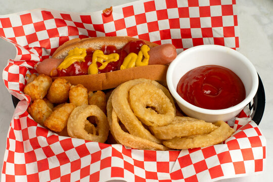 hot dog served with tater tots
