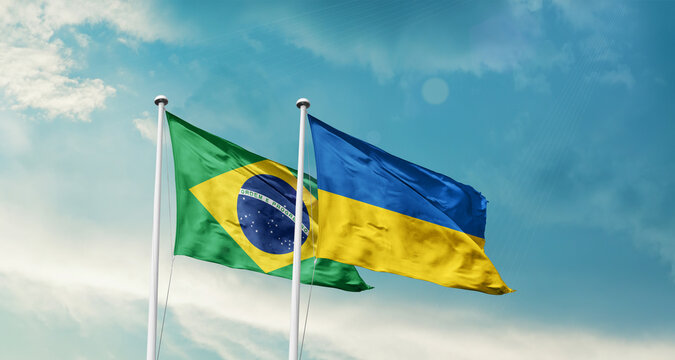 Brazil and Ukraine friendship flags are waving in the sky. Two country flag for agreement or deal. Brazil Ukraine national flag for commitment.