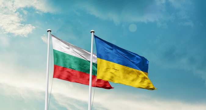 Bulgaria and Ukraine friendship flags are waving in the sky. Two country flag for agreement or deal. Bulgaria Ukraine national flag for commitment.