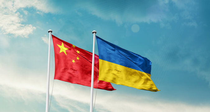 Ukraine and Ukraine friendship flags are waving in the sky. Two country flag for agreement or deal. Ukraine Ukraine national flag for commitment.