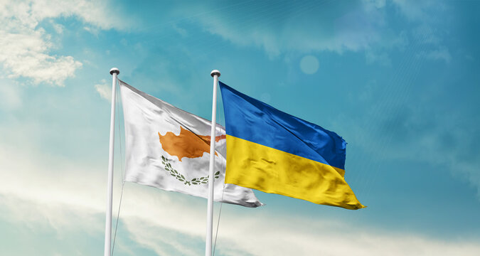 Cyprus and Ukraine friendship flags are waving in the sky. Two country flag for agreement or deal. Cyprus Ukraine national flag for commitment.