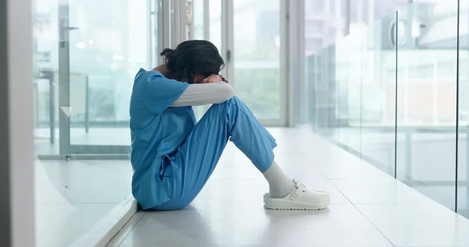 Woman, upset and doctor with stress in hospital for bad news or negative patient results. Migraine, fatigue and mature healthcare worker with burnout for mistake, error or medical fail in clinic.