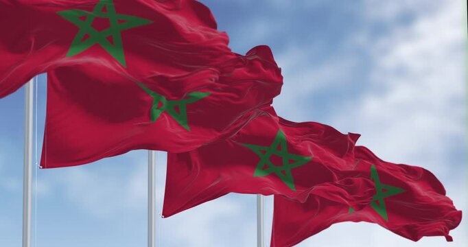 Morocco national flags waving in the wind on a clear day