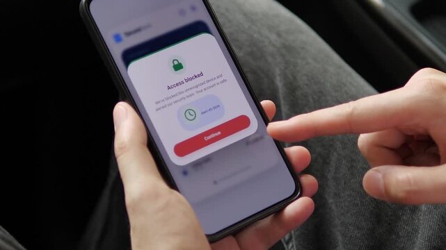Smartphone user views confirmation that suspicious access was blocked, highlighting cyberattack prevention, account protection and rapid response to unauthorized login attempts.