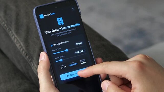 Person adjusts loan term and amount in a mobile mortgage calculator, highlighting digital home financing, housing affordability and changing borrowing costs.