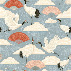 Fototapeta premium Cranes flying and standing with decorative fans and clouds on blue background create elegant seamless pattern design