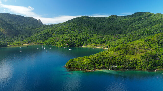 Aerial view of the calm and green lagoon with crystal clear water near the island of Ilha Grande, Brazil