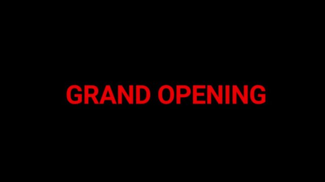 Grand opening title rendered in bright red text on a black background signifies the launch of a new business venture or event location.