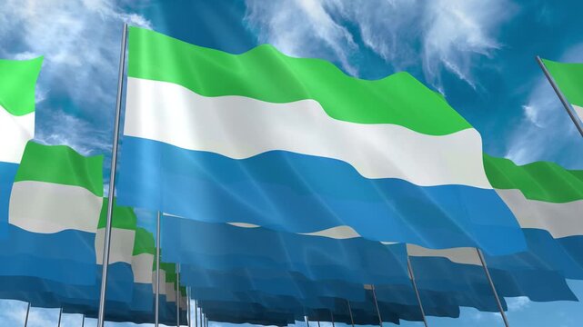 Multiple Sierra Leone flags seamless looping waving on blue sky