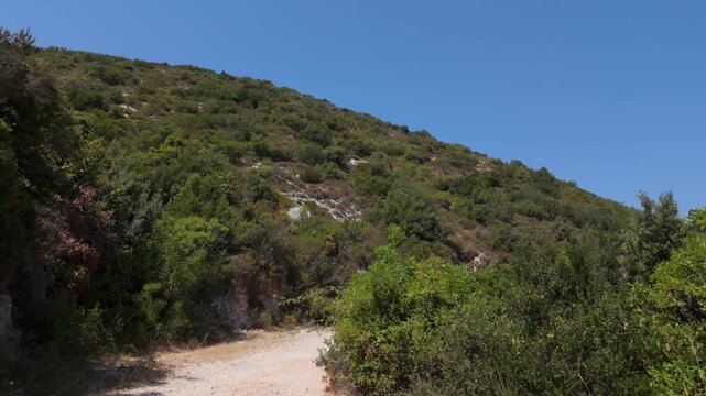 Walking on the offroad path of Karaburun peninsula
