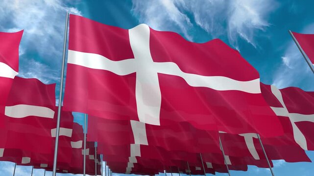 Multiple Denmark flags seamless looping waving on blue sky