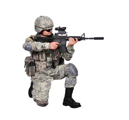 Fototapeta premium Soldier in camouflage uniform kneeling with rifle.