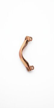 Macro of a beryllium copper wireline centralizer bow spring. Downhole measurement and logging tool hardware with raw industrial finish isolated on white.