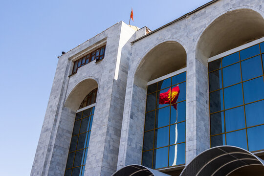 Reflection of Kyrgyzstan National Flag on Government Building
