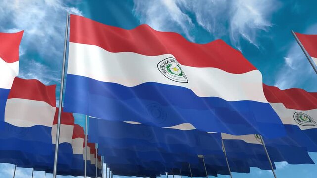 Multiple Paraguay flags seamless looping waving on blue sky