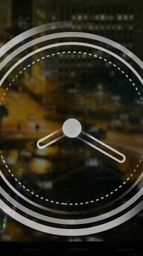 Animation of ticking clock over financial data processing against aerial view of cityscape at night