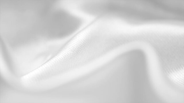 White silk background, texture of beautiful white satin fabric close-up. Abstract smooth backdrop. Rotating, slow motion, top view. 