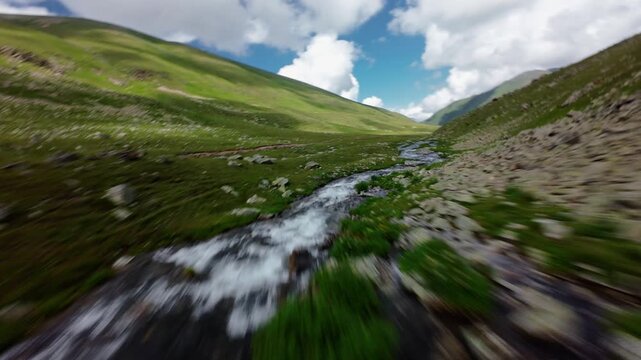 Aerial Forward Tracking Shot Over Mountain Stream