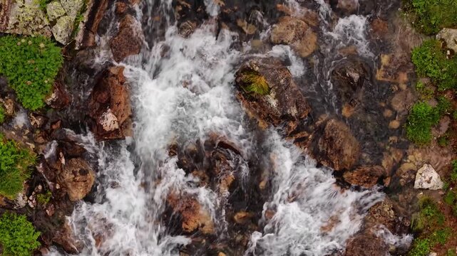 Fast flowing mountain stream with white water rapids