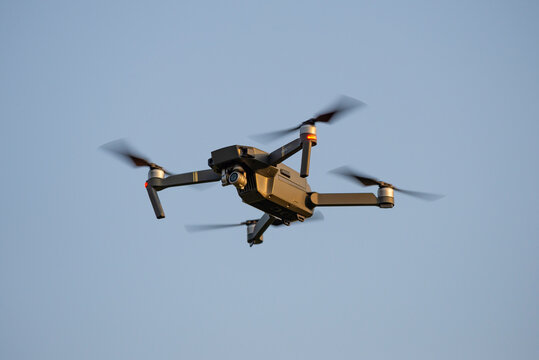 LENINGRAD REGION, RUSSIA - SEPTEMBER 26, 2020: DJI Mavic Pro quadcopter in flight. Front view