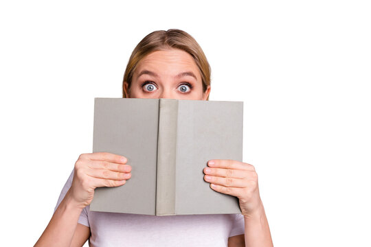 Close up photo of astonished teen teenager millennial hide face cheeks impressed horrible novelty exam lecture news prepare text book textbook wear fashionable clothing isolated grey background