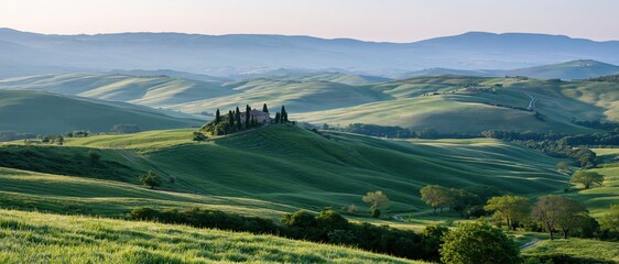 Fototapeta premium The Serene Rolling Hills Landscape with Verdant Valleys and Distant Mountains
