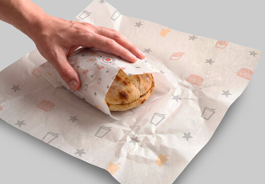 Food Wrap Paper Mockup with Hand