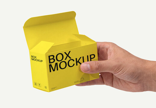 Hand Holding Packaging Box Mockup