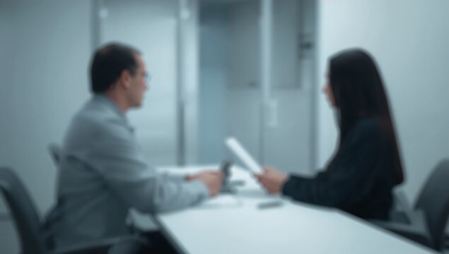 Generative AI depicts a business interview taking place in an office setting