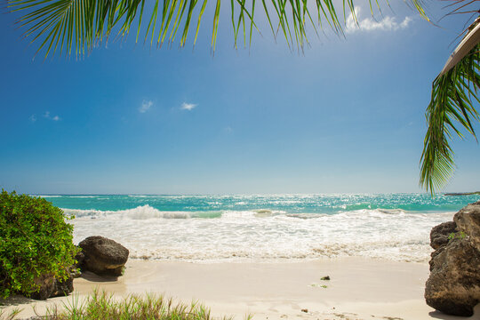 Turquoise Caribbean Sea with White Sand and Gentle Ocean Waves