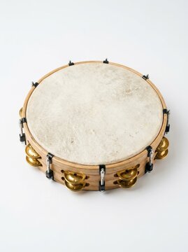 Professional Wooden Tambourine with Natural Skin Head and Brass Jingles Isolated on White Background