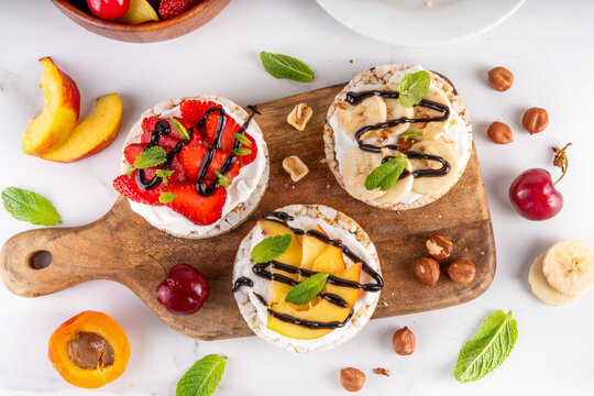 Rice Crackers Healthy diet sandwiches with fruits and berries