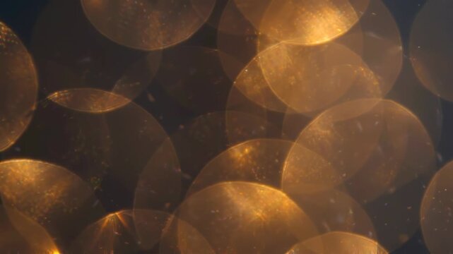 Cascading radiant halos in grey and gold tones, glowing light overlay bringing glamour energy to advertising design work