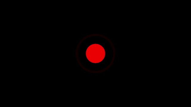 Red recording icon on black background. Pulsing record button with blinking light. Digital camera interface element for video production