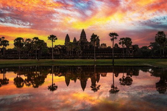 Famous viiew of Angkor wat temple,dramatic sky at sunrise with water reflections, Siem Reap, Cambodia
