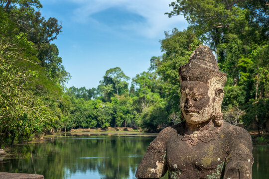 Deva statue at Preah Khan temple west gate in Angkor, Siem Reap, Cambodia