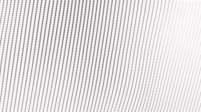 Abstract pattern of white diagonal light dots on black background a minimalist consisting of parallel lines small on a solid