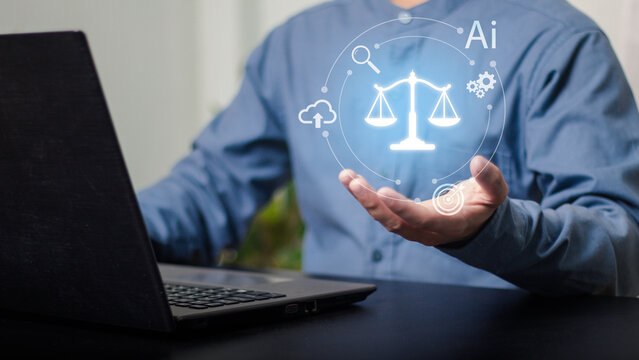 Legal ethics, compliance, regulation, business law and corporate governance. Businessman holding legal information on a laptop with digital law and search interface.