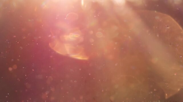 Ethereal light bleed in rose and gold tones - creative abstract texture conveying harmony for presentation visual storytelling