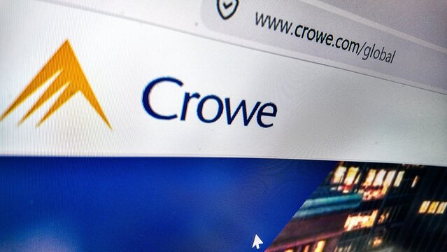 a computer screen with crowe website displayed..Crowe LLP is a licensed independent CPA firm that provides attest services to its clients
