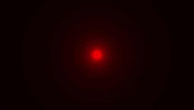 red light flare transition effect, red circular light pulse animation loop. minimalist red signal blink on black background.