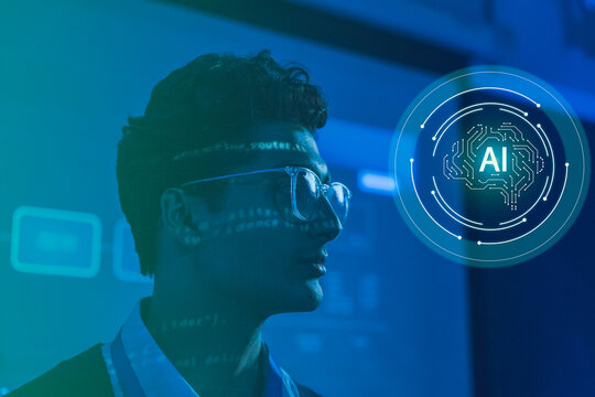 AI software developer with code projected across his face beside a digital artificial intelligence brain interface, representing machine learning, innovation and future technology