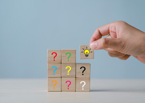 New business ideas and strategic consulting. Mobile wooden block with light bulb icon. Brainstorming creativity and expertise.