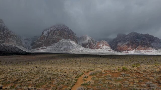 Aerial Snow Covered Red Rock Mountains Las Vegas Desert Winter Flyover