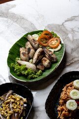 Grilled Mentarang Angelwing Clams on Banana Leaf © udeyismail