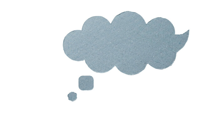 Minimalist blue thought bubble paper cutout, isolated speech cloud on white background, textured paper chat icon for communication