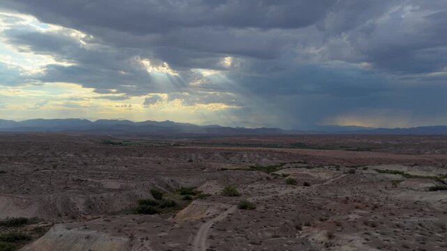 Aerial Mojave Desert Clark County Dramatic Clouds and Mountains Flyover