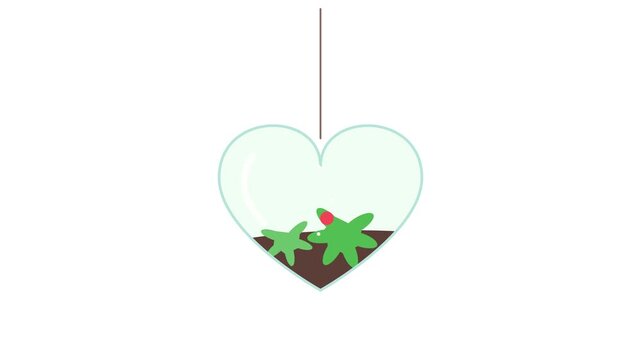 Ladybug Walking on Green Sprouts Inside a Heart Shaped Glass Terrarium
