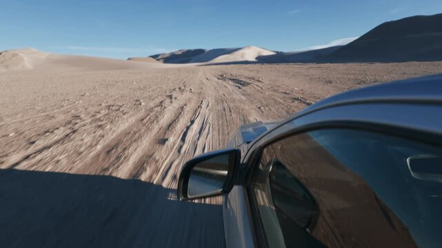 Offroad SUV Pick Up Truck driving through Campo de Piedra Pomez in Catamarca Argentina Side Mirror POV sunrise