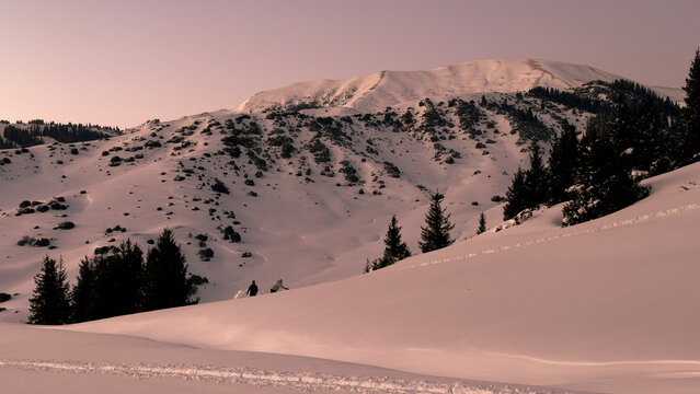 Afterglow on the horizon, mountains of Jyrgalan village, Kyrgyzstan